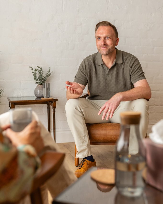 Rob Higgins in conversation in the counselling room.